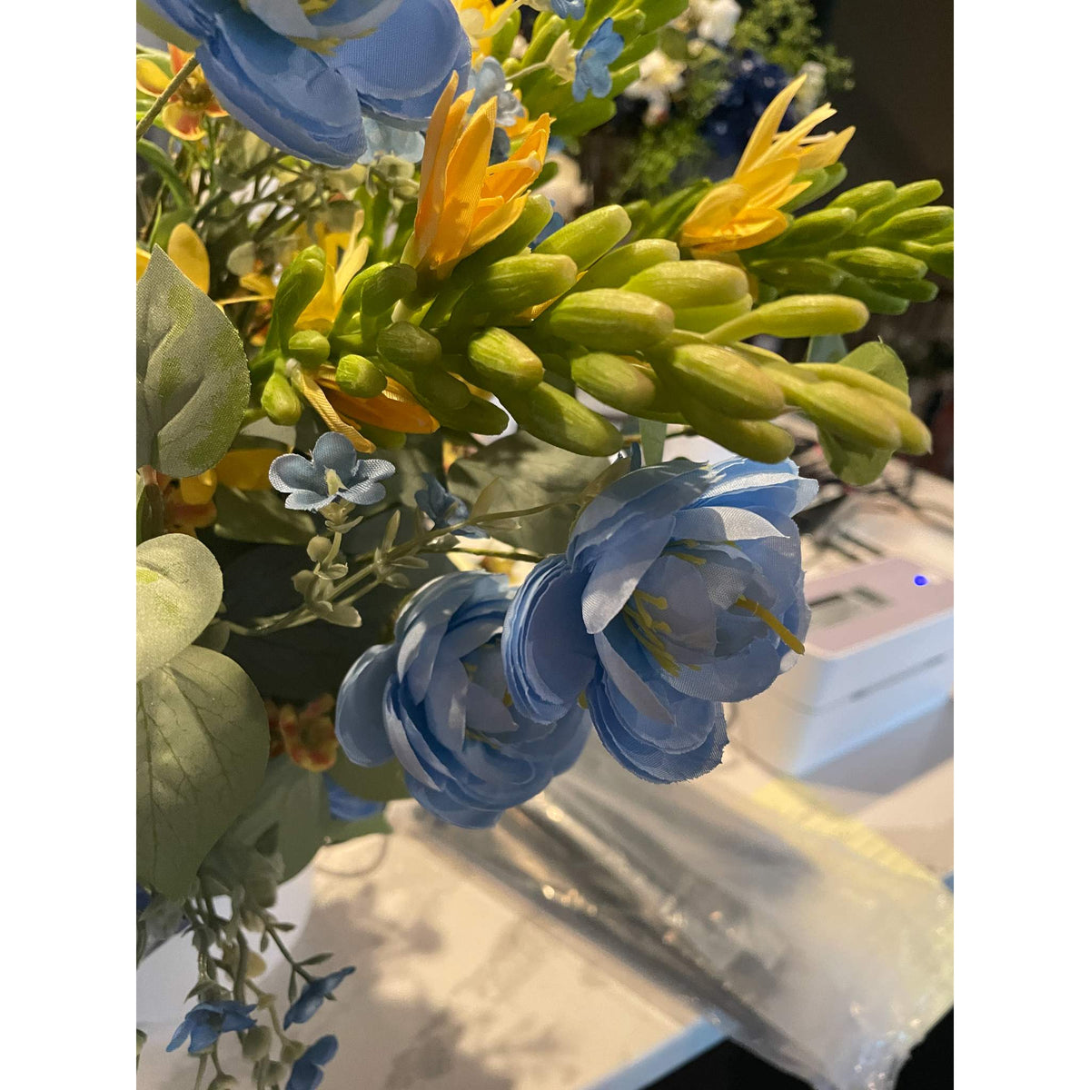 Blue and Yellow Floral Centerpiece in White Ceramic Planter - Spring