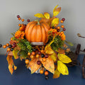 Fall Pumpkin Centerpiece with Orange Flowers in Whitewashed Basket