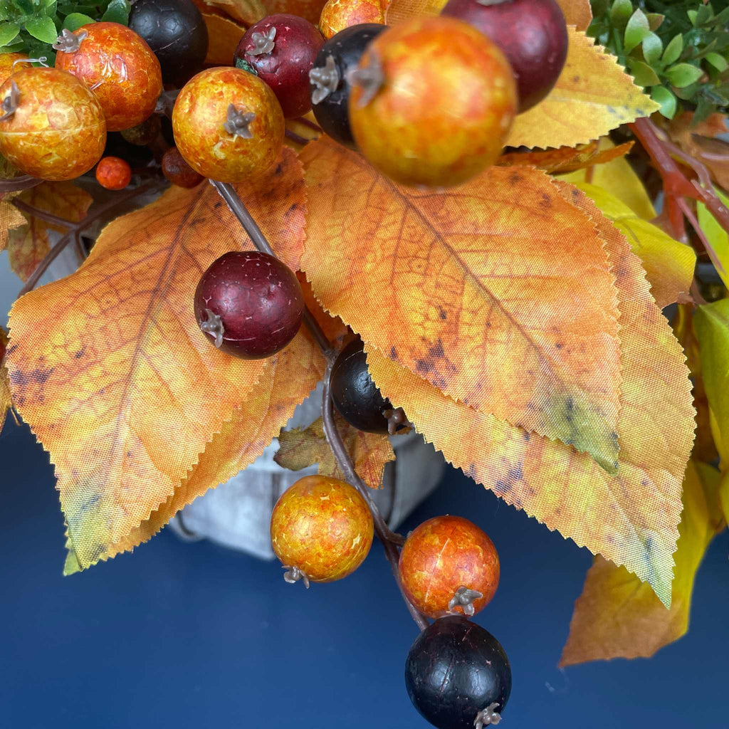 Fall Pumpkin Centerpiece with Orange Flowers in Whitewashed Basket