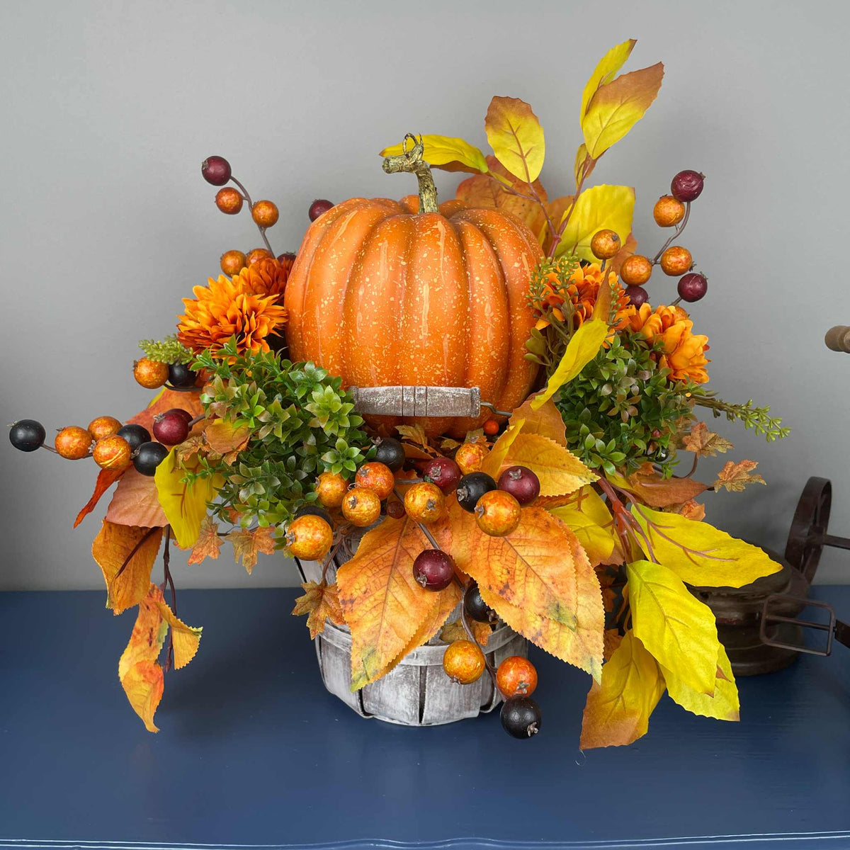 Fall Pumpkin Centerpiece with Orange Flowers in Whitewashed Basket