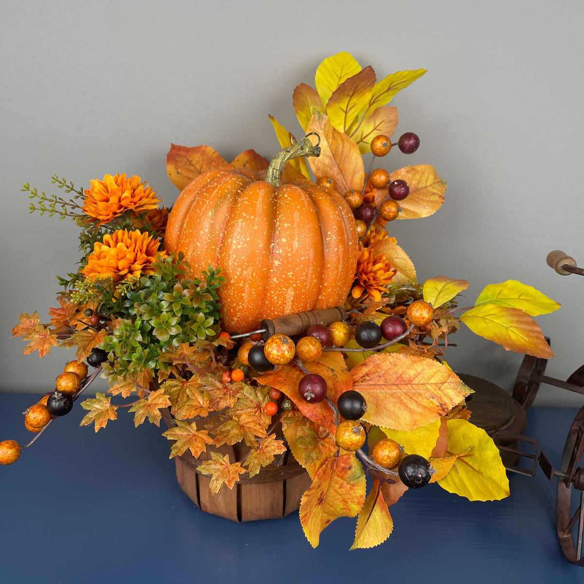 Fall Pumpkin Centerpiece in Wood Basket with Orange Marigolds