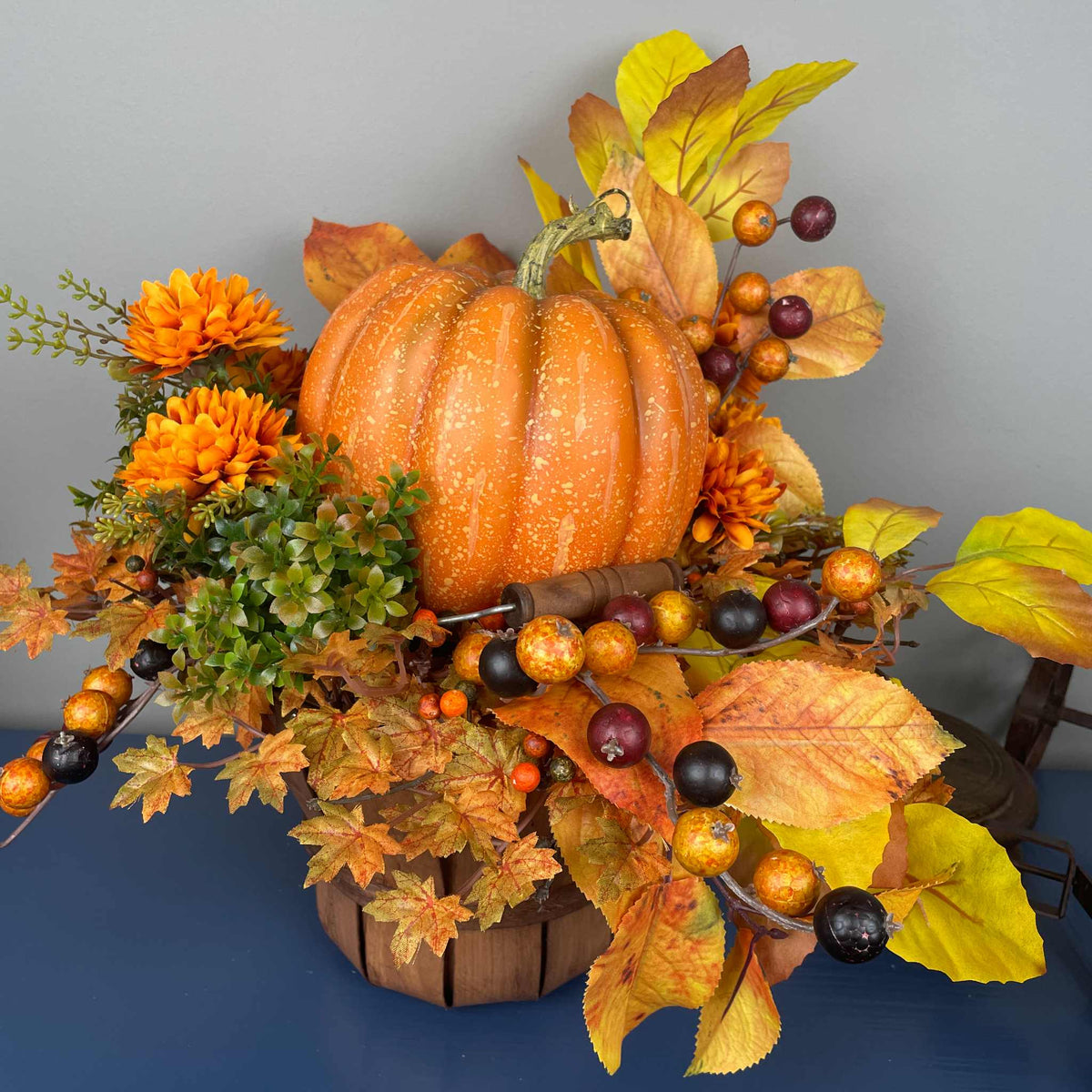 Fall Pumpkin Centerpiece in Wood Basket with Orange Marigolds