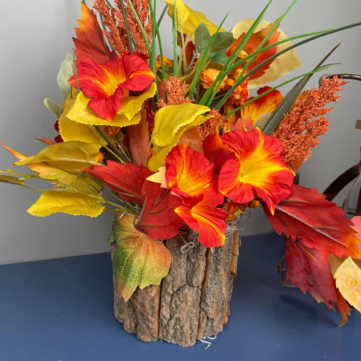 Fall Floral Arrangement in Rustic Bark Planter with Orange Lilies