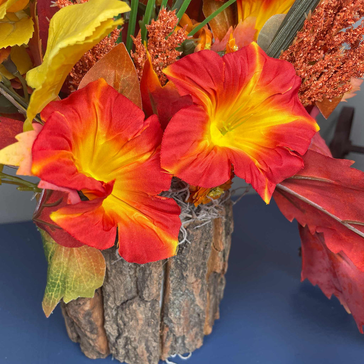 Fall Floral Arrangement in Rustic Bark Planter with Orange Lilies