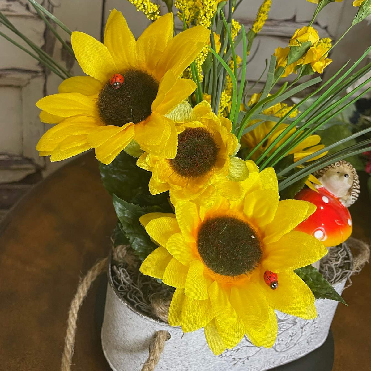 Yellow Sunflower Centerpiece in White Metal Planter with Hedgehog
