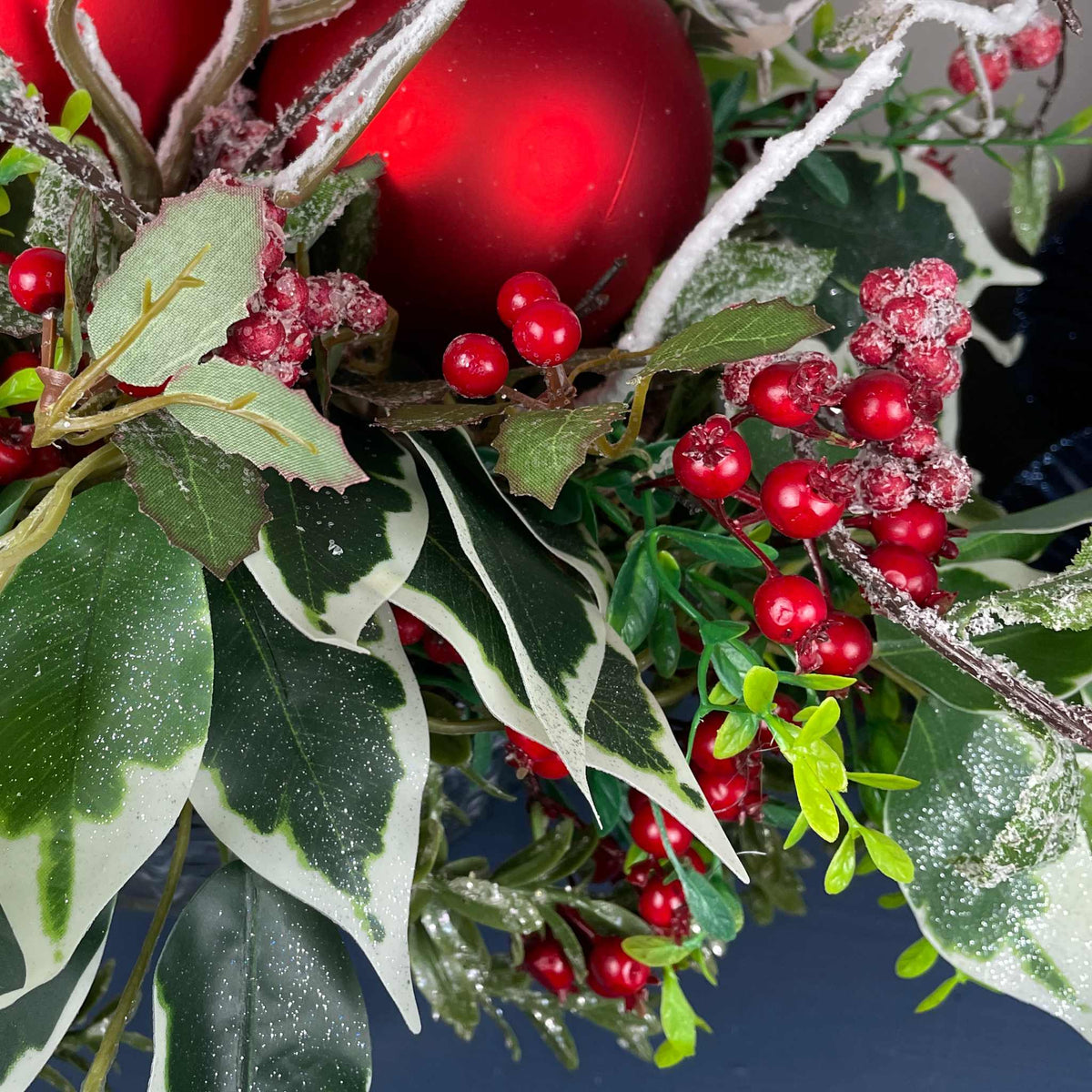 Christmas Centerpiece with Oversized Red Ornaments & Snow Branches