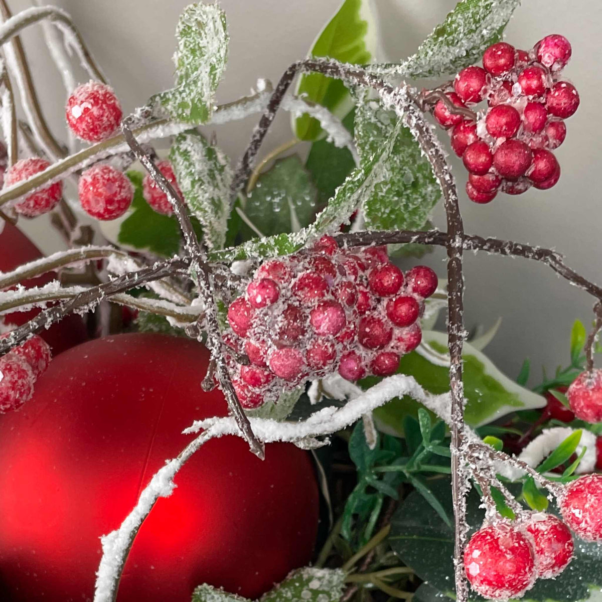 Christmas Centerpiece with Oversized Red Ornaments & Snow Branches