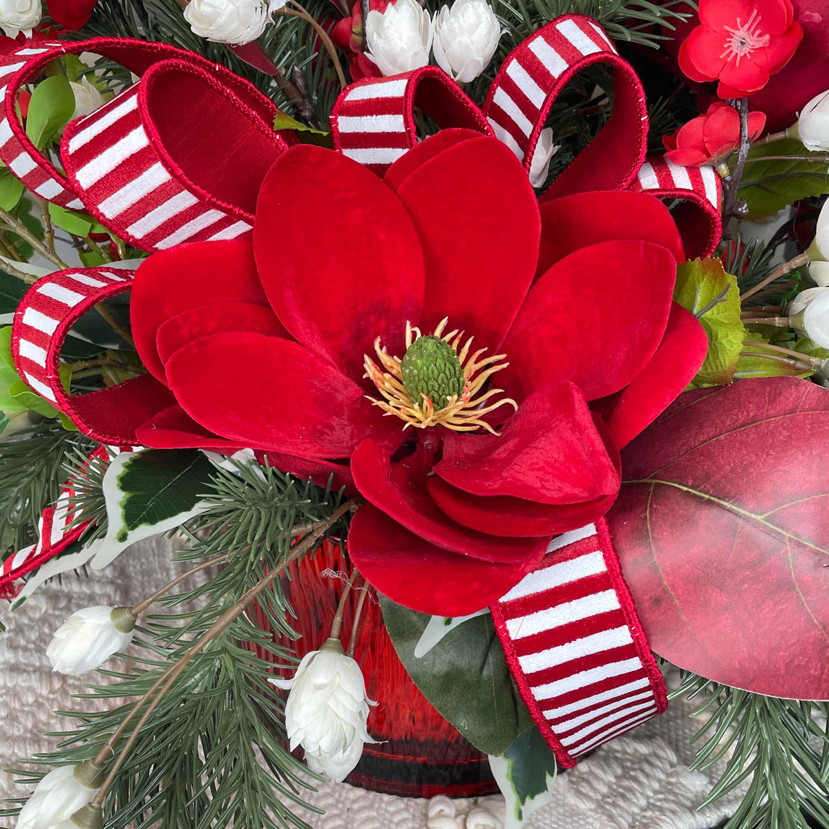 Christmas Centerpiece with Red Velvet Magnolias and Pine Greenery