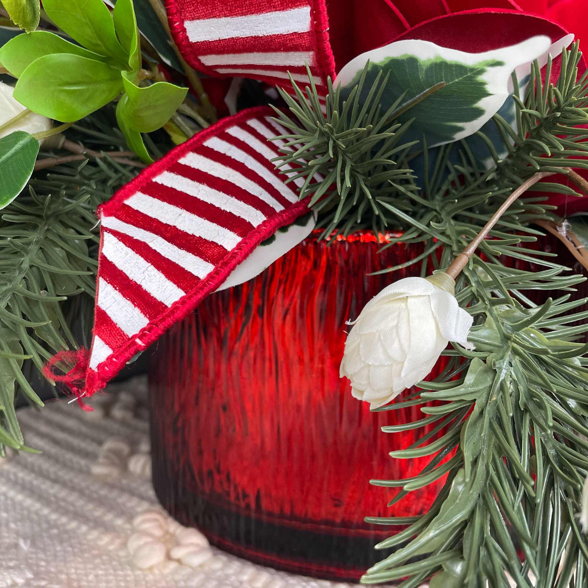 Christmas Centerpiece with Red Velvet Magnolias and Pine Greenery