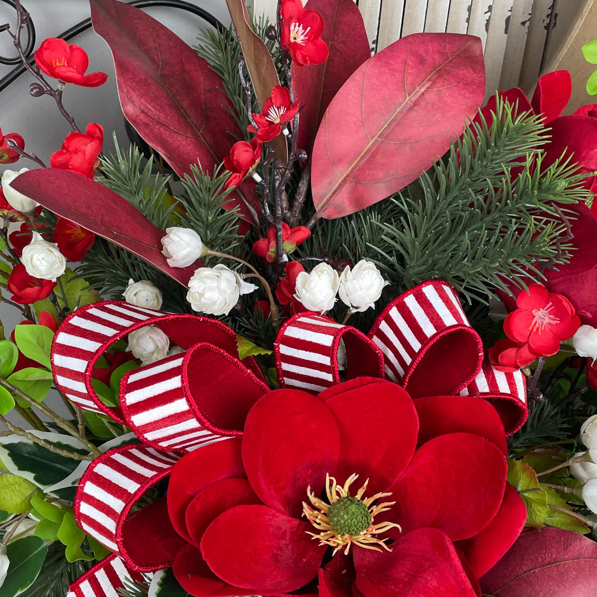 Christmas Centerpiece with Red Velvet Magnolias and Pine Greenery