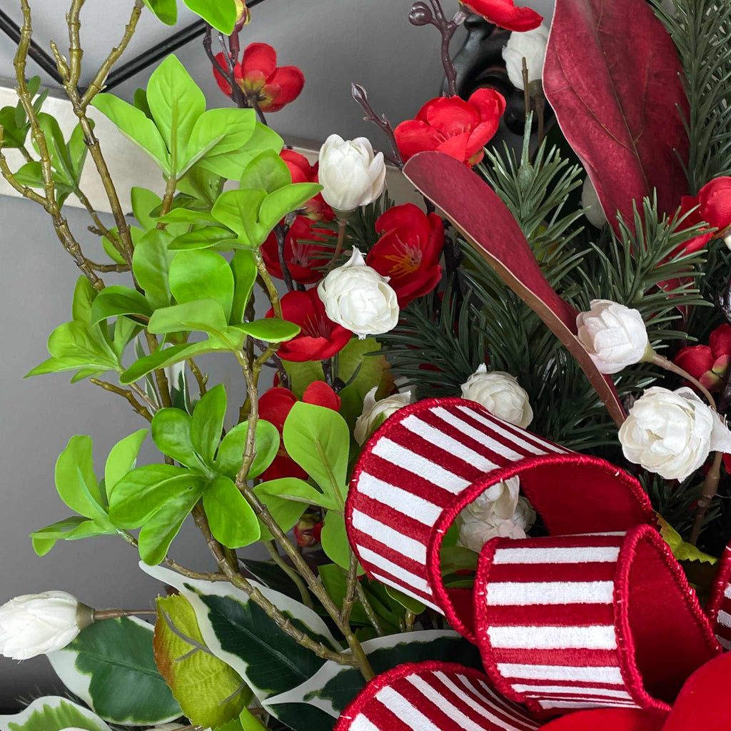 Christmas Centerpiece with Red Velvet Magnolias and Pine Greenery
