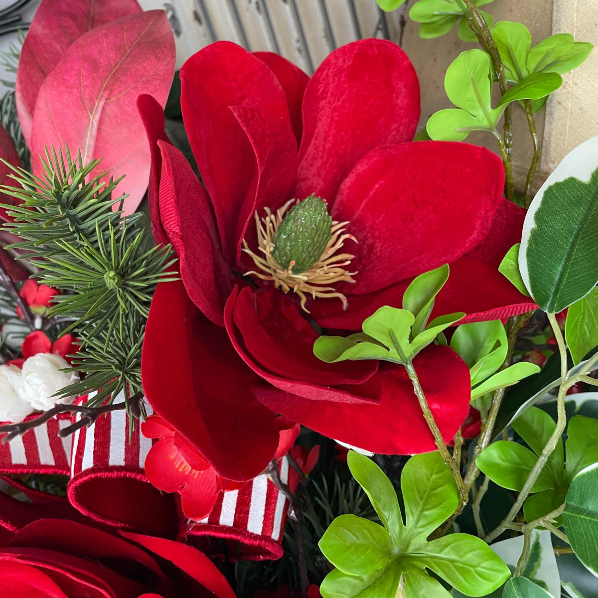 Christmas Centerpiece with Red Velvet Magnolias and Pine Greenery