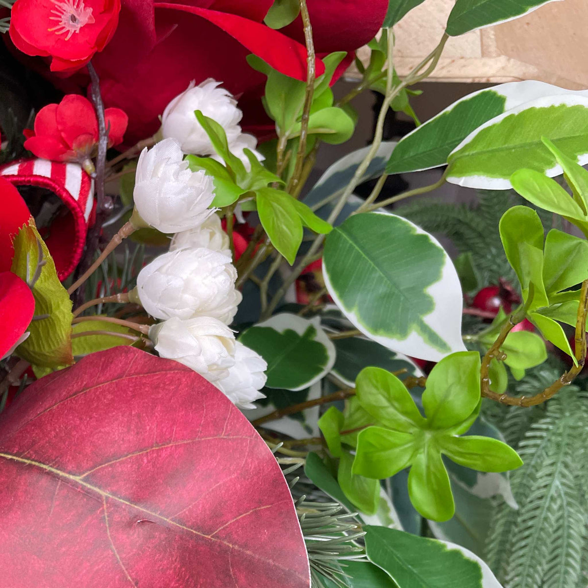 Christmas Centerpiece with Red Velvet Magnolias and Pine Greenery