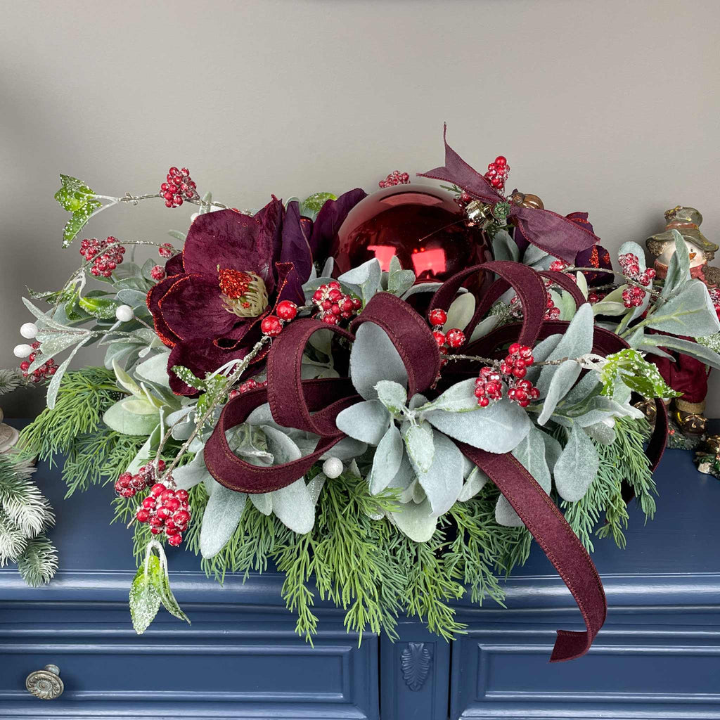 Christmas Centerpiece with Plum Magnolias and Burgundy Ornament Tray