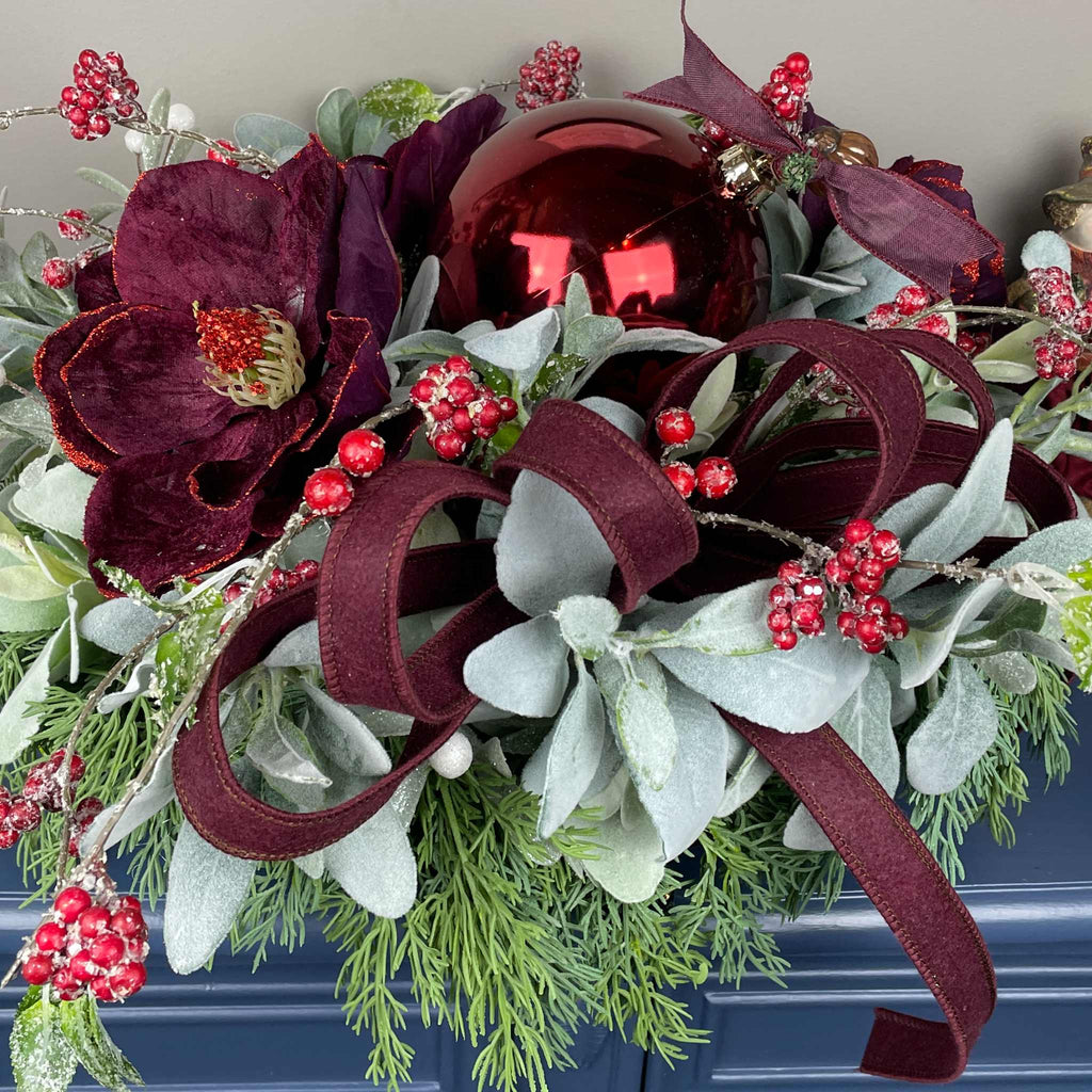 Christmas Centerpiece with Plum Magnolias and Burgundy Ornament Tray