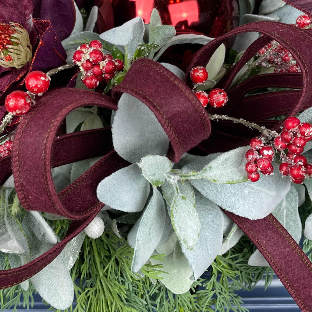 Christmas Centerpiece with Plum Magnolias and Burgundy Ornament Tray