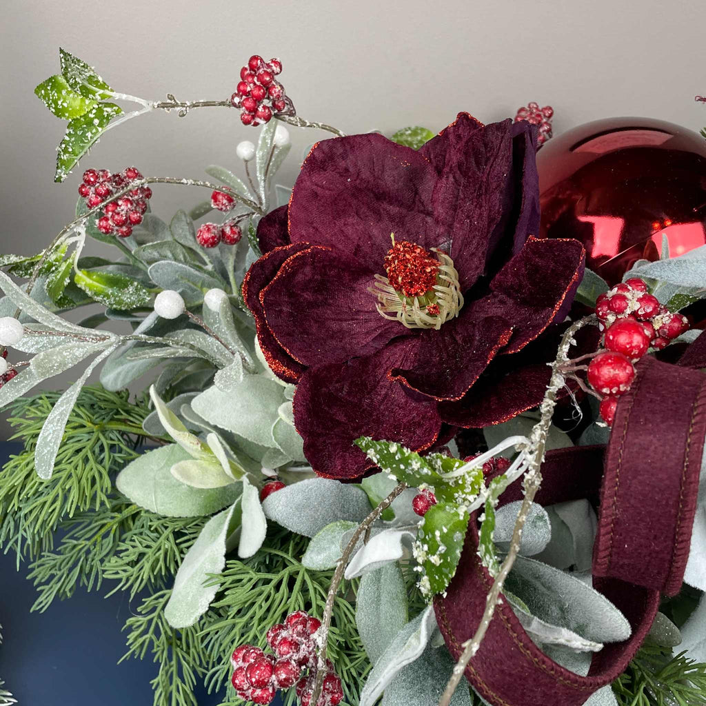 Christmas Centerpiece with Plum Magnolias and Burgundy Ornament Tray