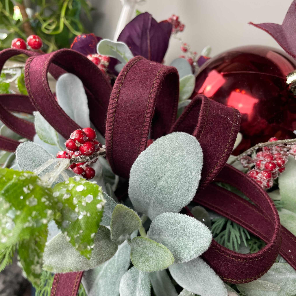 Christmas Centerpiece with Plum Magnolias and Burgundy Ornament Tray