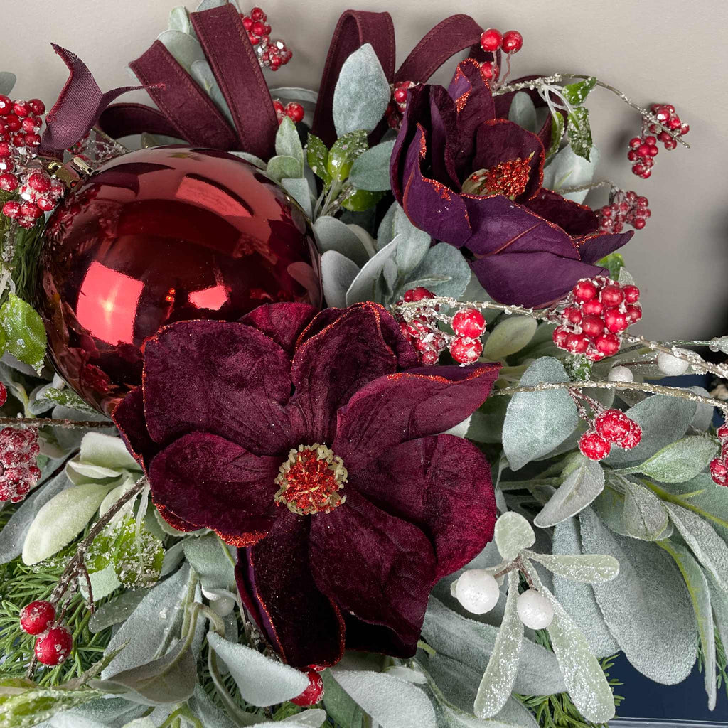 Christmas Centerpiece with Plum Magnolias and Burgundy Ornament Tray