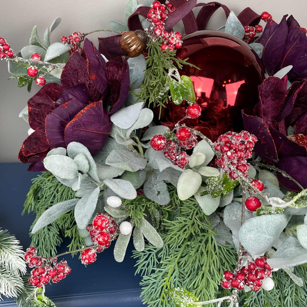 Christmas Centerpiece with Plum Magnolias and Burgundy Ornament Tray