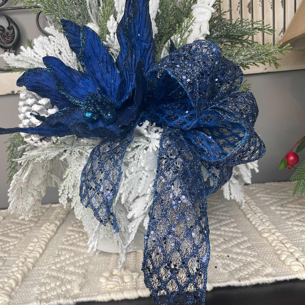 Winter Blue Poinsettia Centerpiece with Snowy Cedar & Snowflake Pail