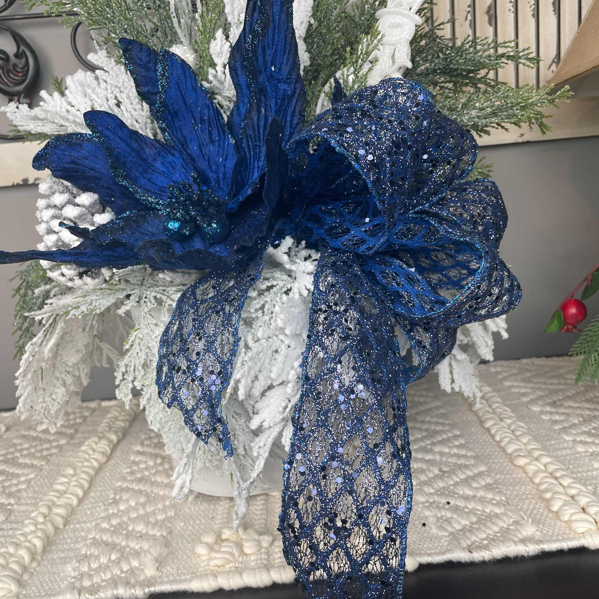 Winter Blue Poinsettia Centerpiece with Snowy Cedar & Snowflake Pail