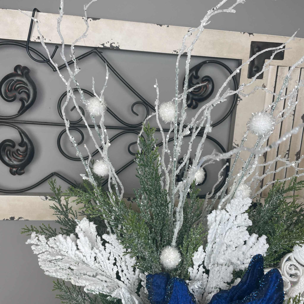 Winter Blue Poinsettia Centerpiece with Snowy Cedar & Snowflake Pail