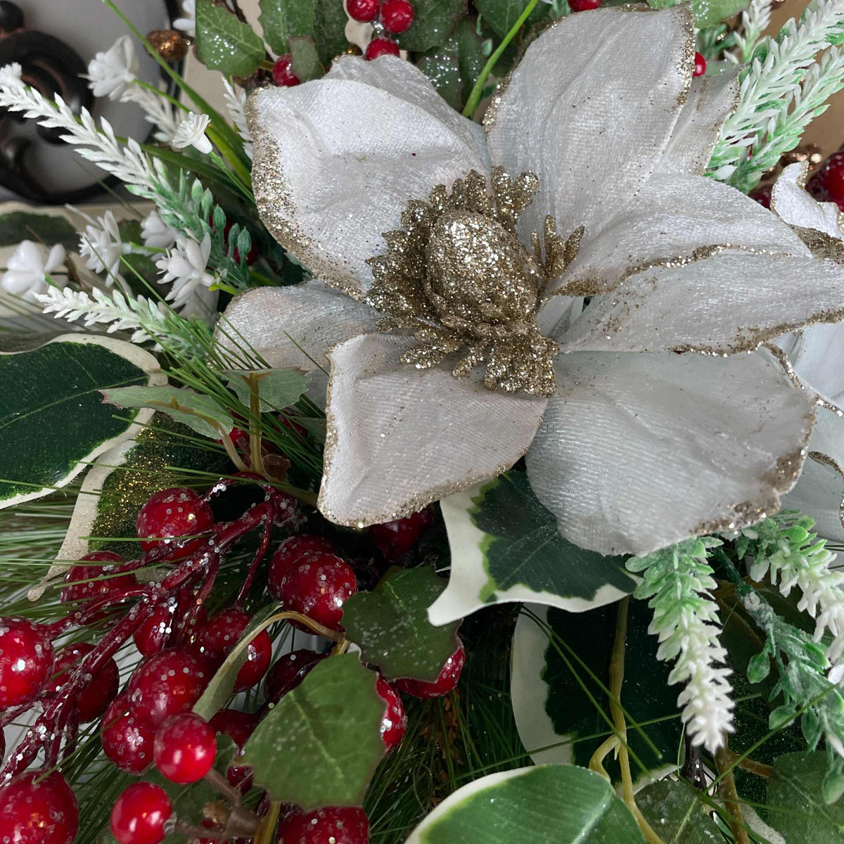 Christmas Magnolia Arrangement in Black Metal Vase White & Red Florals