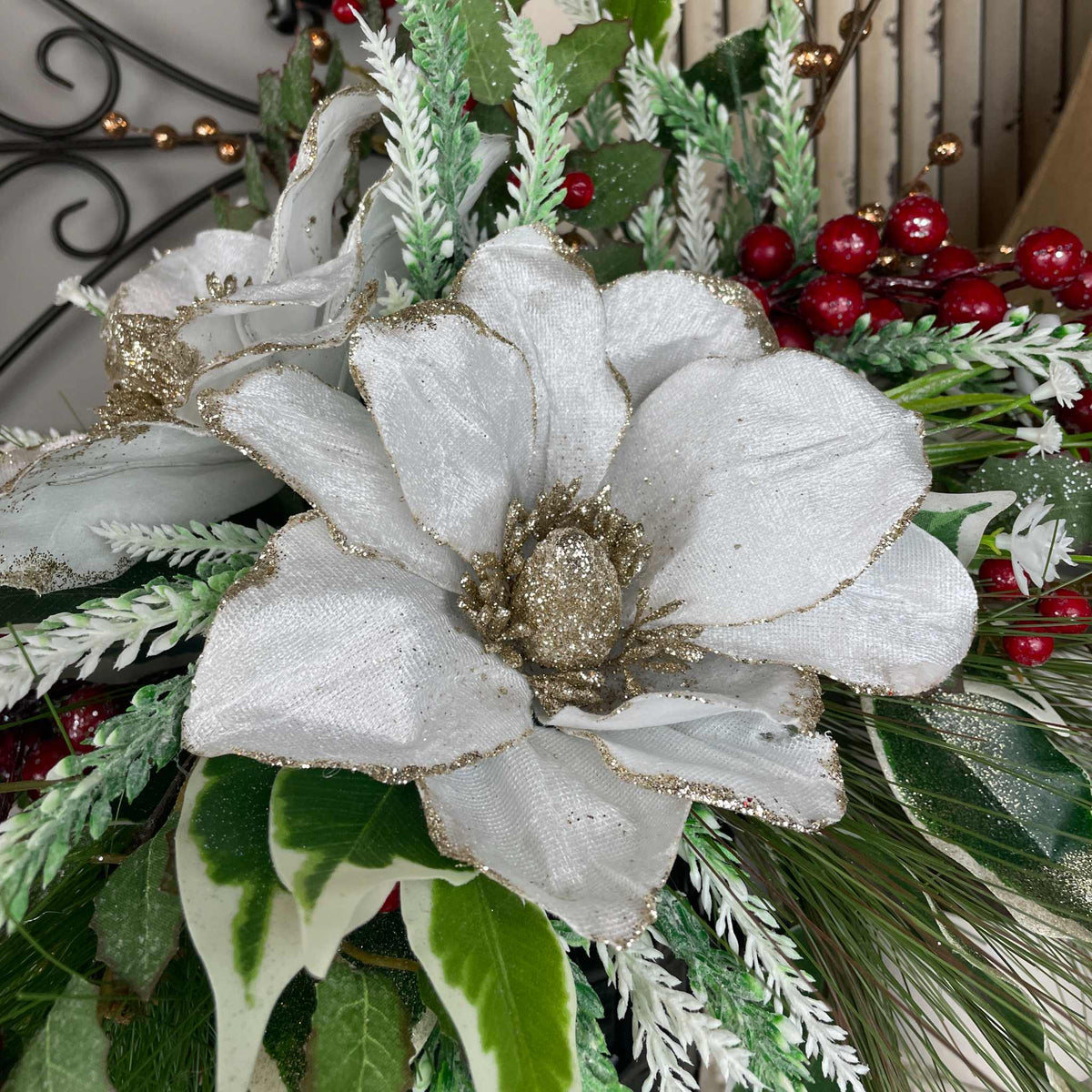 Christmas Magnolia Arrangement in Black Metal Vase White & Red Florals