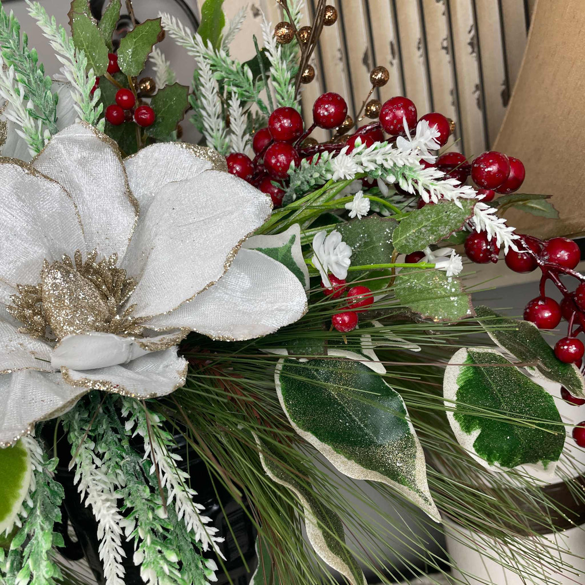 Christmas Magnolia Arrangement in Black Metal Vase White & Red Florals