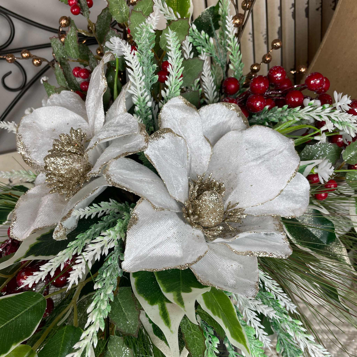 Christmas Magnolia Arrangement in Black Metal Vase White & Red Florals