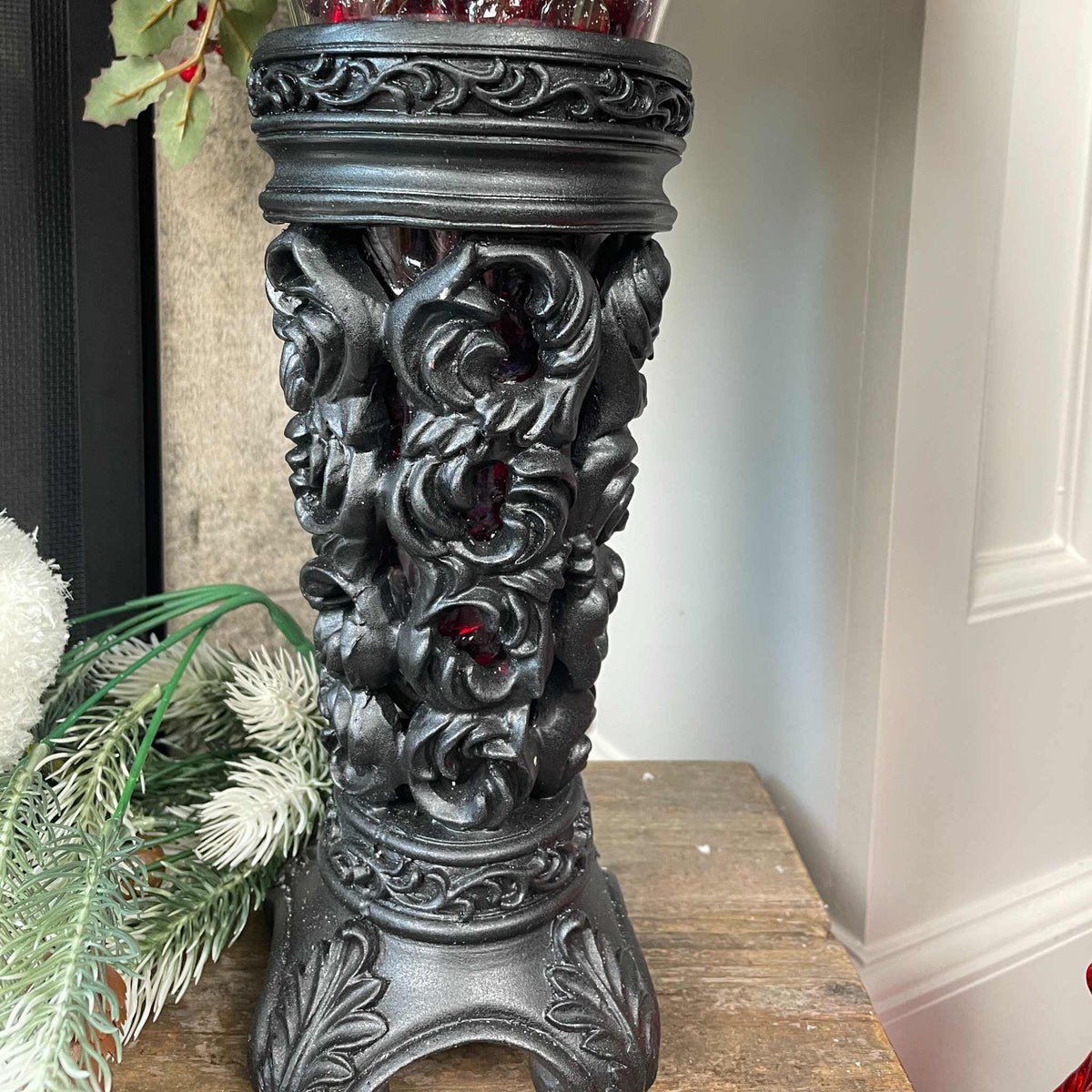 Christmas Floral Centerpiece with Iced Berries & Navy Blue Bow in Cast Iron Vase