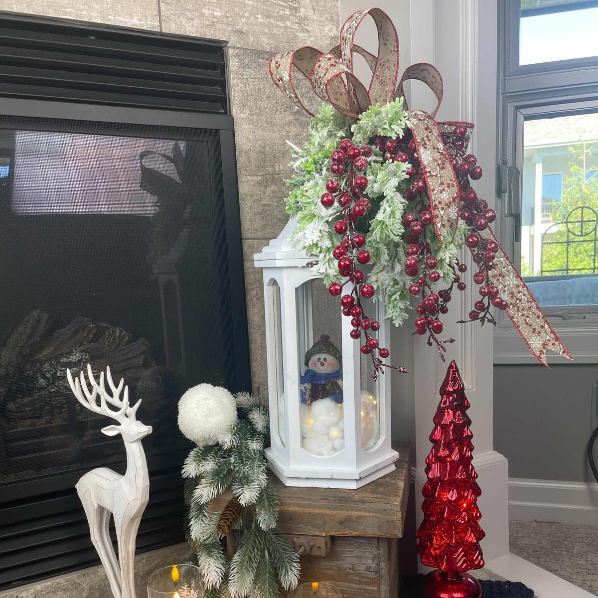 Christmas Lantern Centerpiece with Snowman and Red Berry Greenery