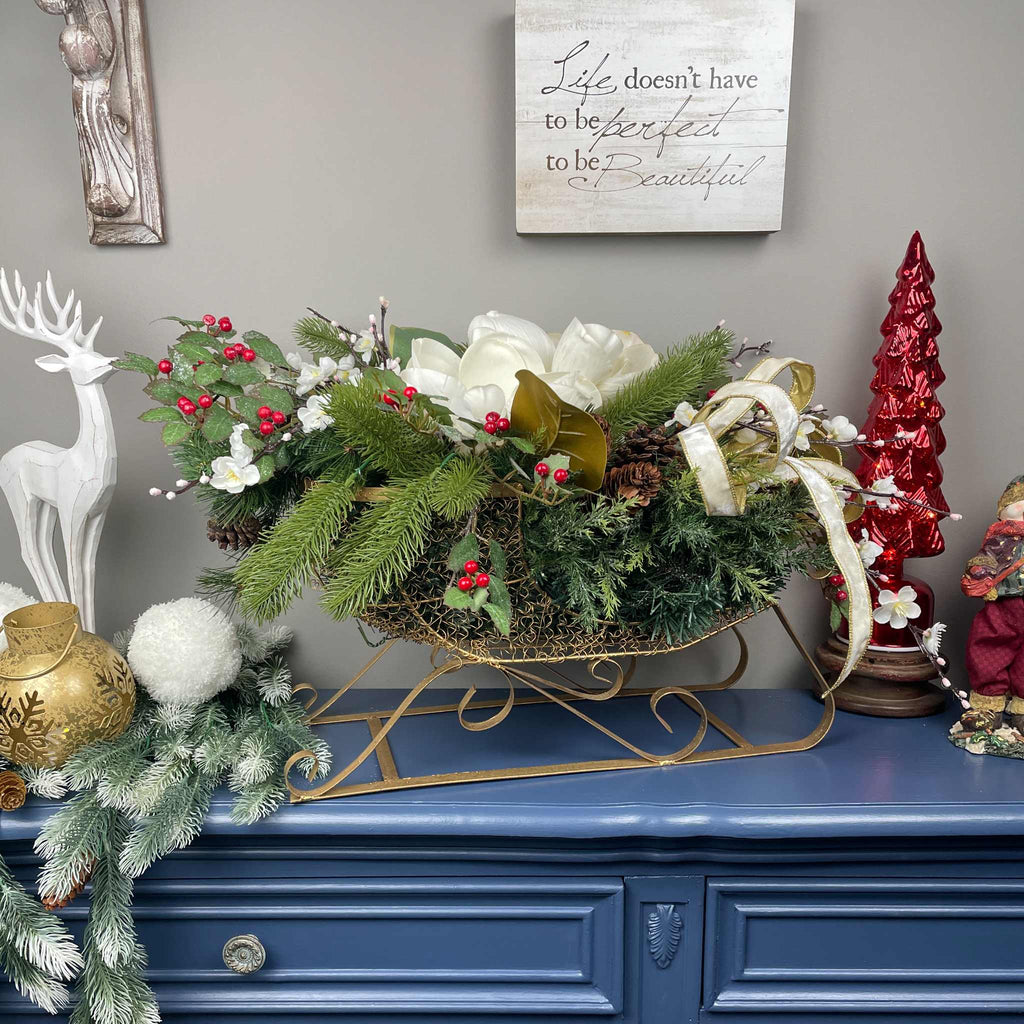 Christmas Metal Sleigh Centerpiece with Cream Magnolias & Holly