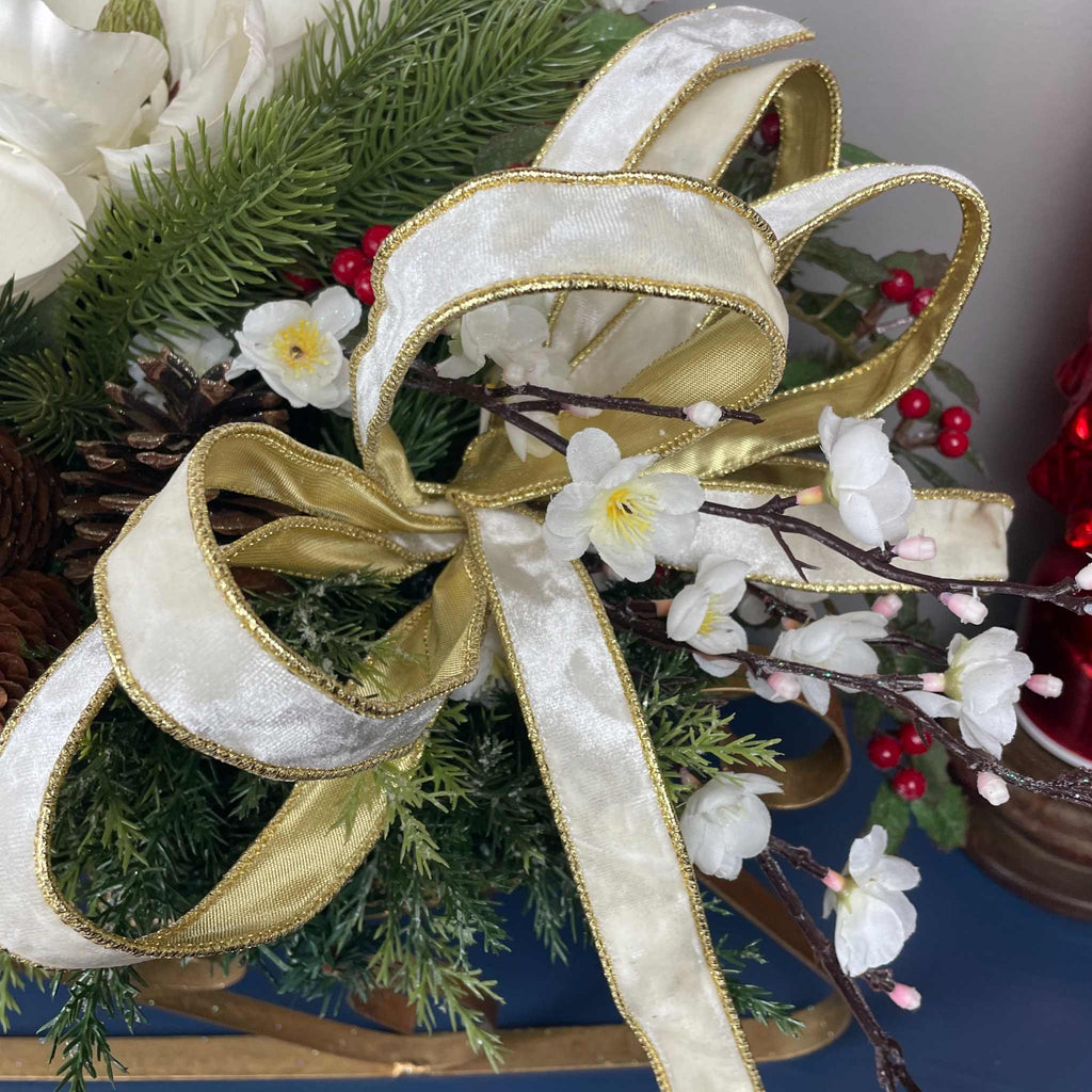 Christmas Metal Sleigh Centerpiece with Cream Magnolias & Holly