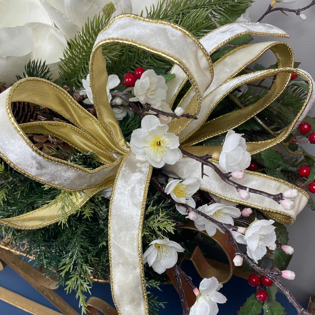 Christmas Metal Sleigh Centerpiece with Cream Magnolias & Holly