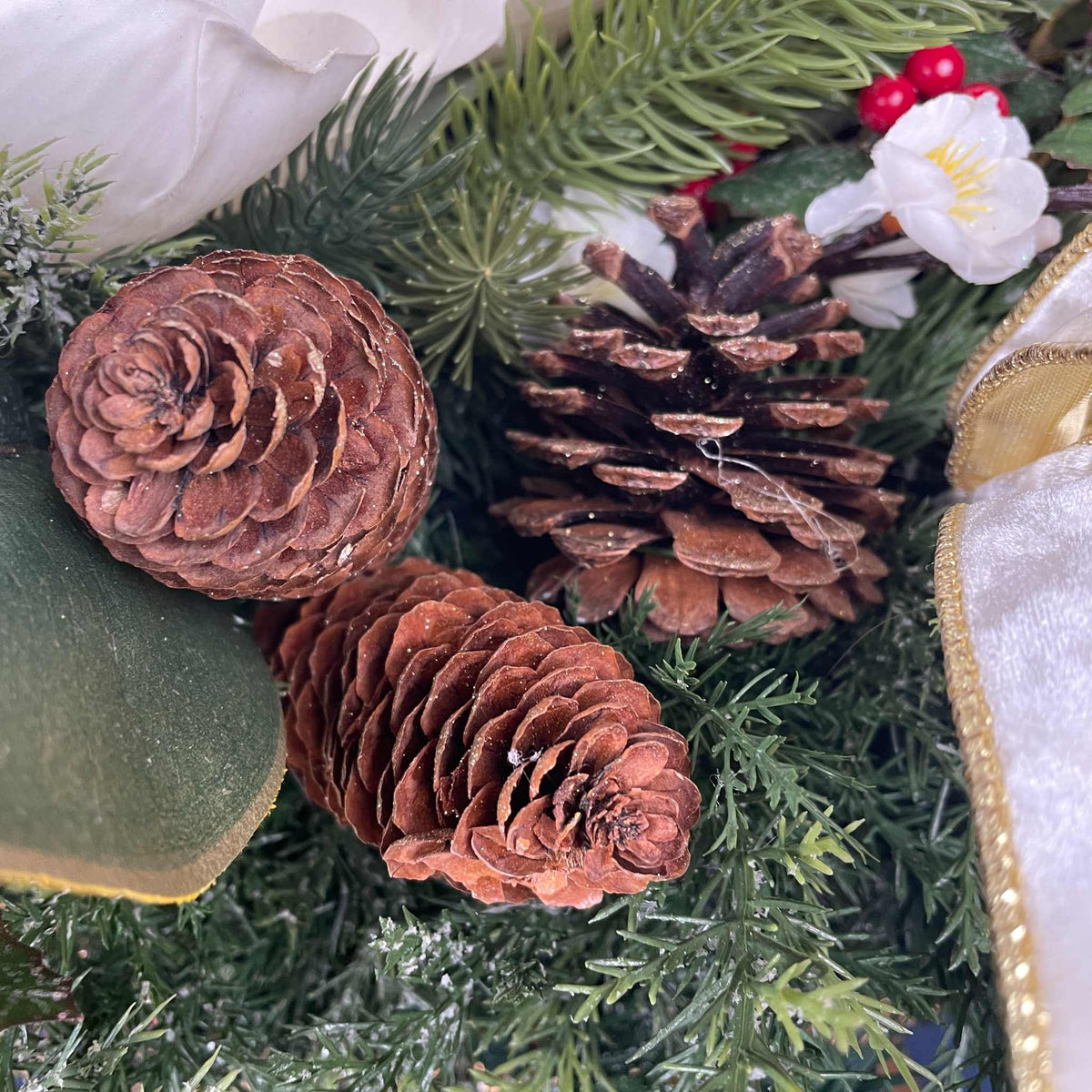 Christmas Metal Sleigh Centerpiece with Cream Magnolias & Holly