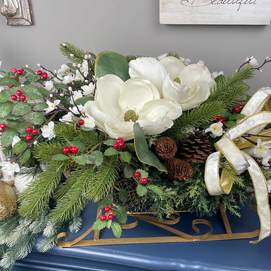Christmas Metal Sleigh Centerpiece with Cream Magnolias & Holly
