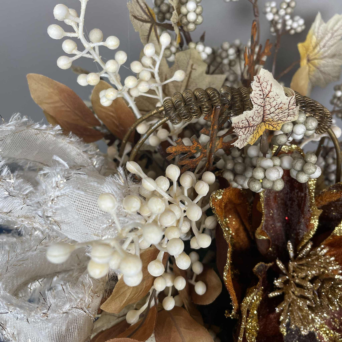 Bronze Magnolia Christmas Arrangement in Gold Metal Basket with Handle