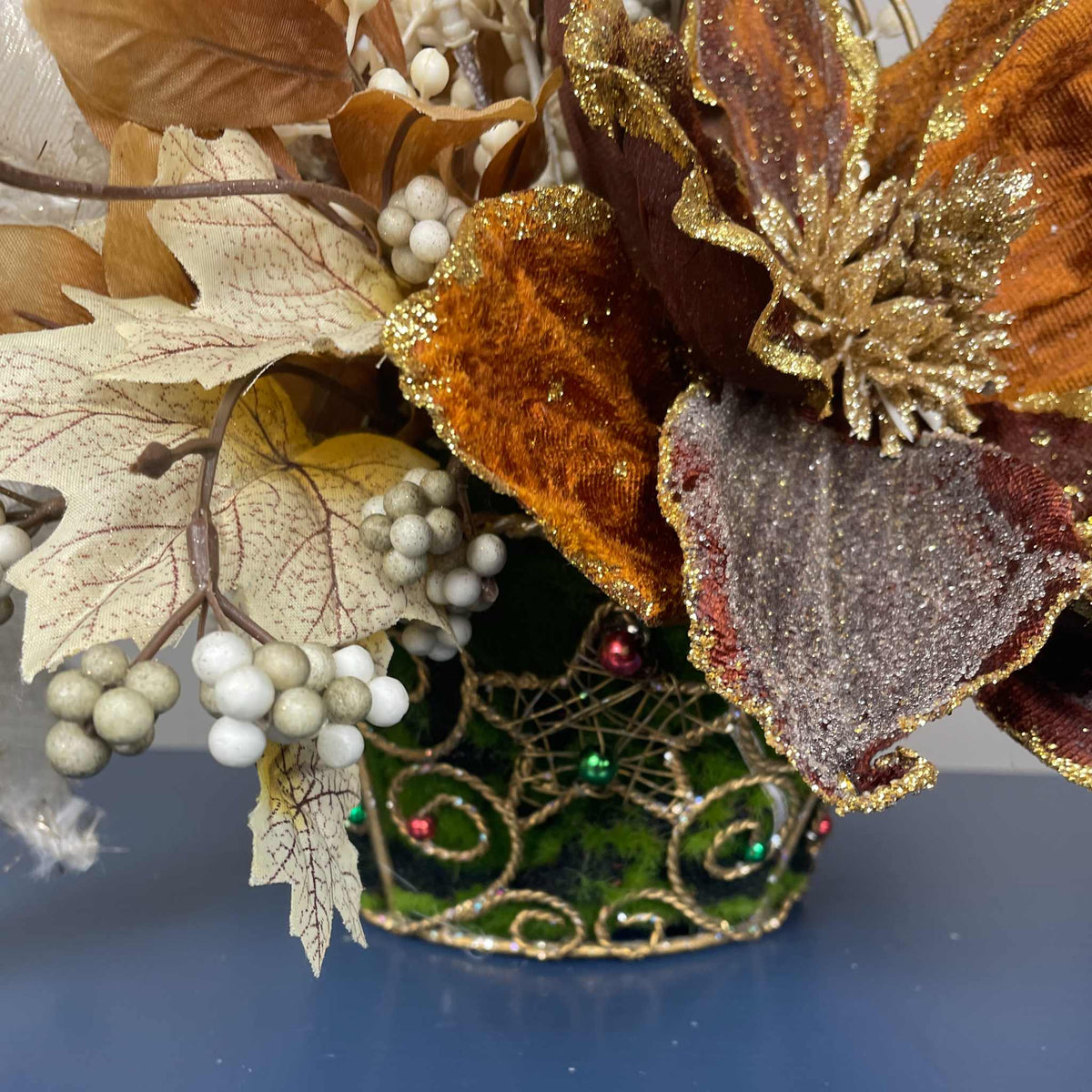 Bronze Magnolia Christmas Arrangement in Gold Metal Basket with Handle