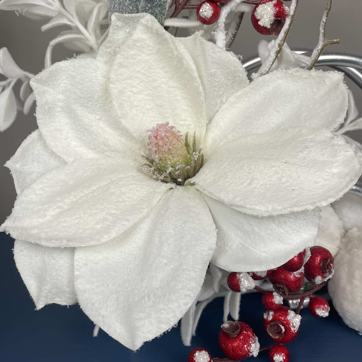 Christmas Centerpiece with Snowy Magnolia Red Berries Silver Rings