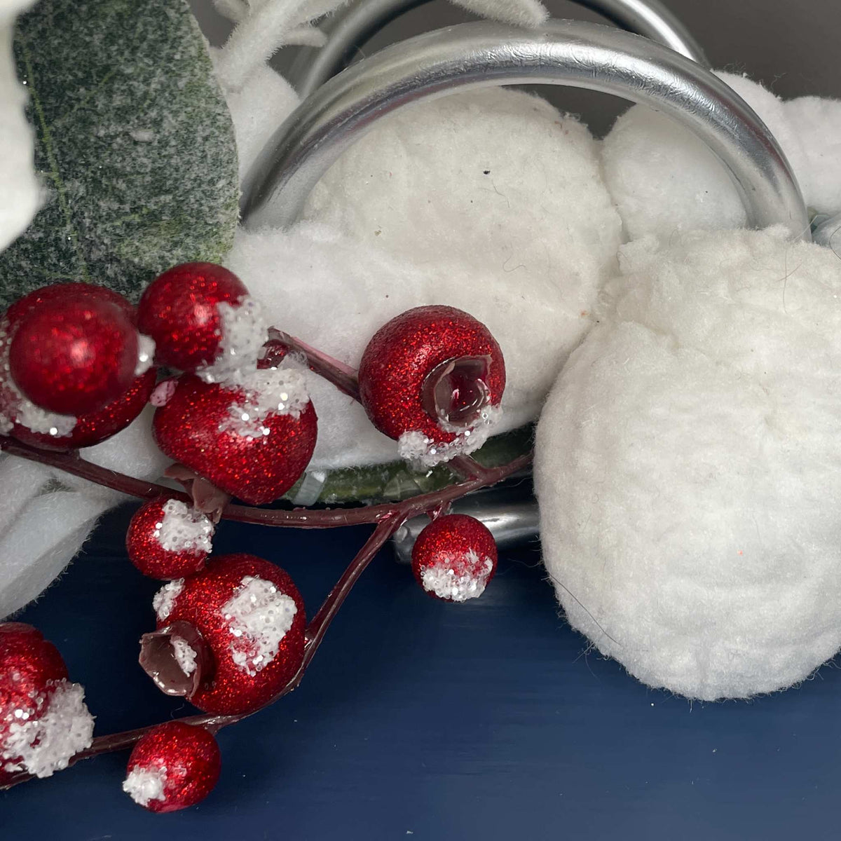 Christmas Centerpiece with Snowy Magnolia Red Berries Silver Rings