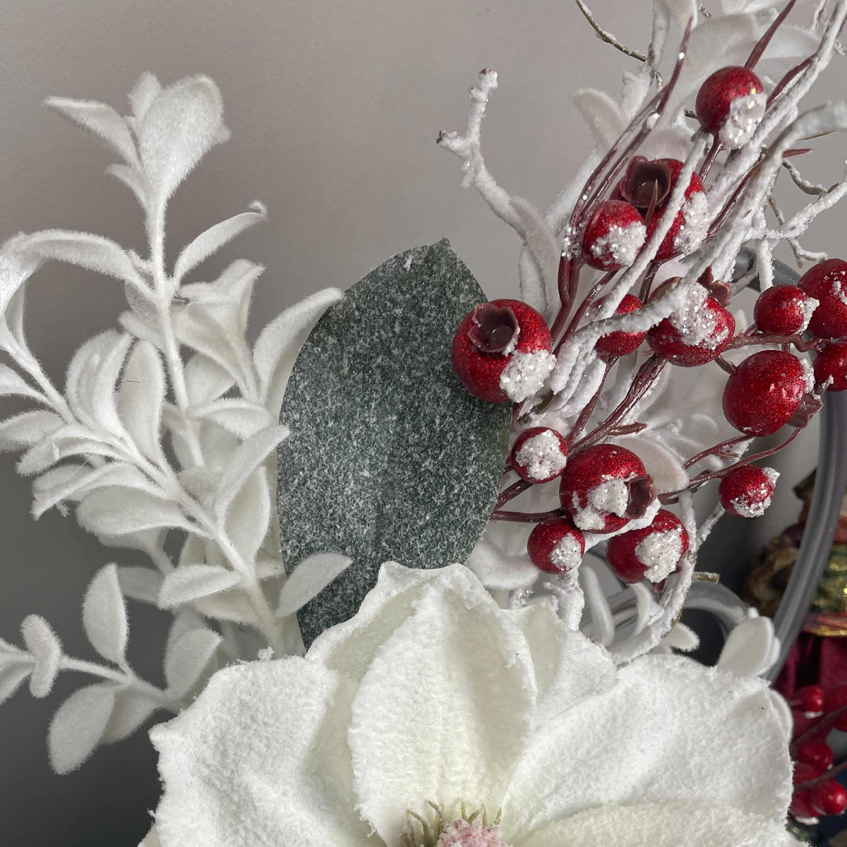 Christmas Centerpiece with Snowy Magnolia Red Berries Silver Rings