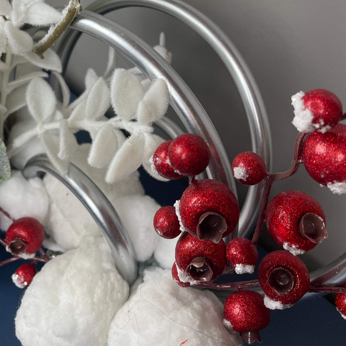 Christmas Centerpiece with Snowy Magnolia Red Berries Silver Rings