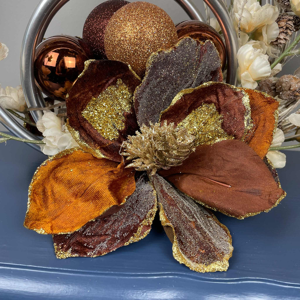 Bronze Magnolia Centerpiece with Cream Flowers & Silver Rings
