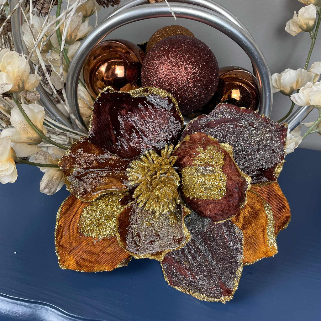 Bronze Magnolia Centerpiece with Cream Flowers & Silver Rings