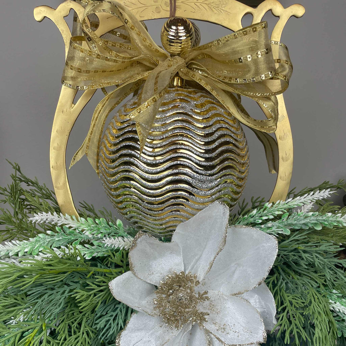 Gold Christmas Centerpiece with White Magnolias on Gong Stand Decor
