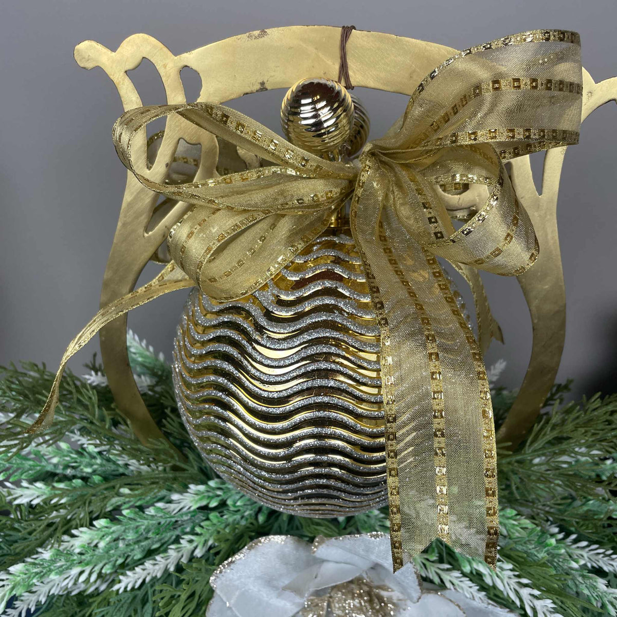 Gold Christmas Centerpiece with White Magnolias on Gong Stand Decor